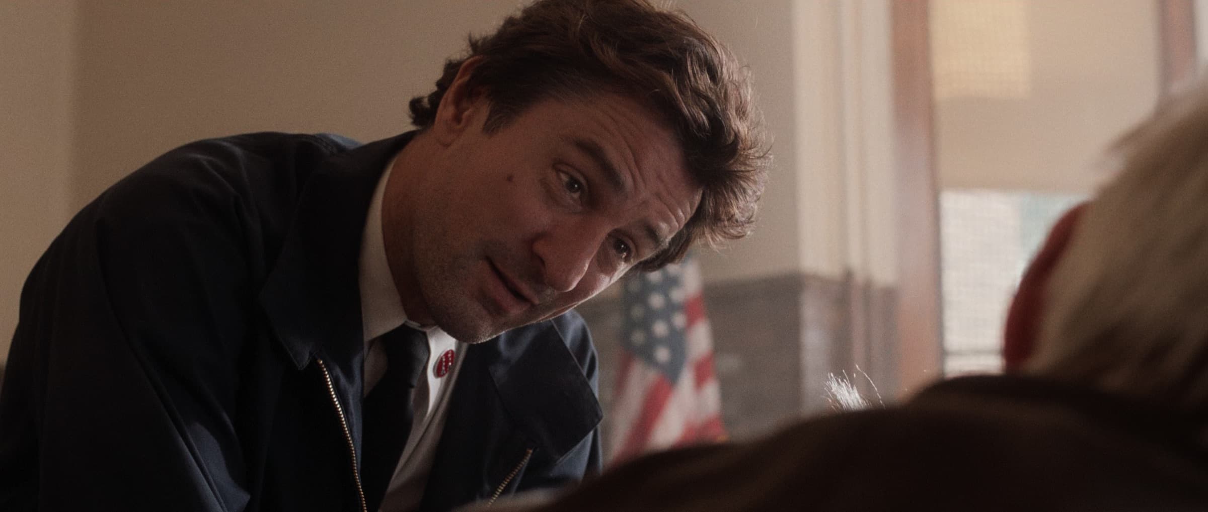 Robert De Niro as Rimgale, leaning in
